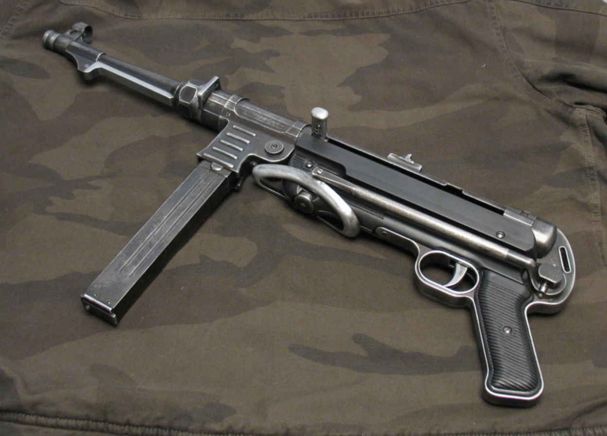 Мп 40. Мр40 Шмайсер. МП 40 буллпап. Автомат Шмайсер.МП-38-40. Mp40 SMG.