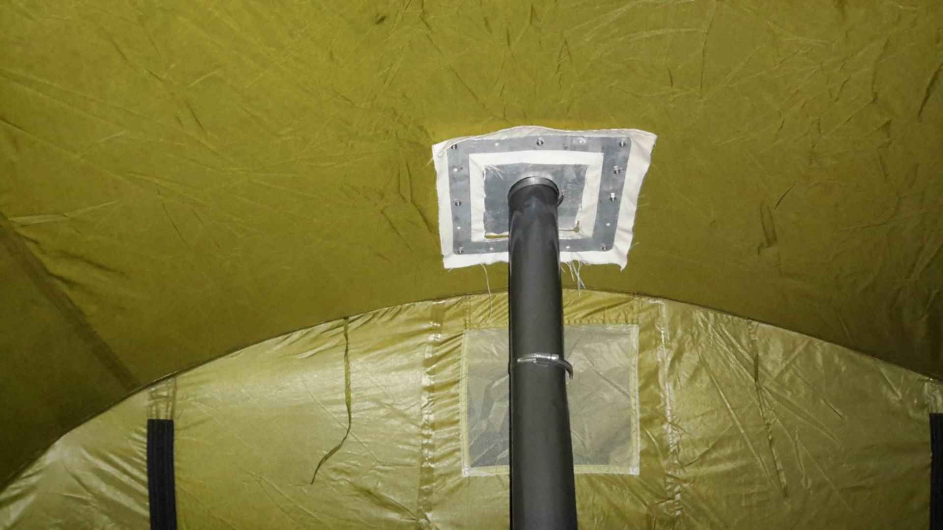 Как сделать отверстие в палатке под трубу от печки