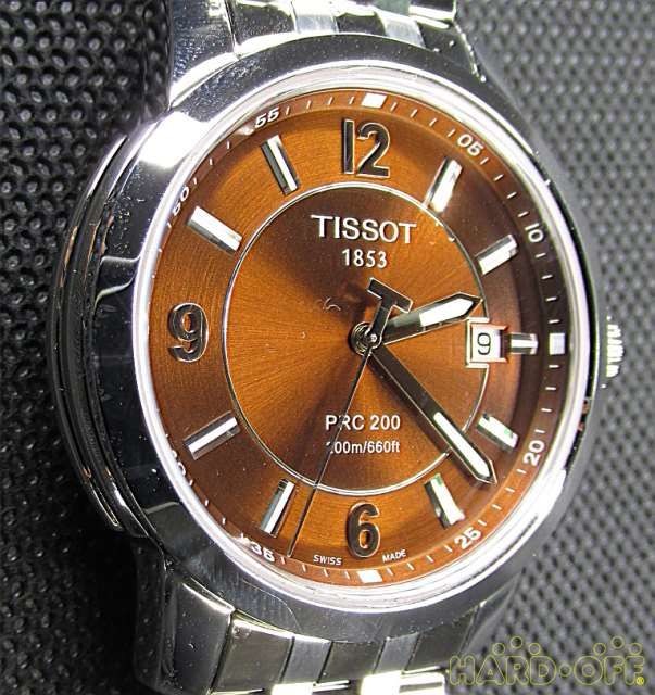 Продам тиссот. Часы Tissot t014.410. Часы тиссот с коричневым циферблатом. Tissot 1853 PRC 200 200m/660ft. Часы тиссот коричневые.